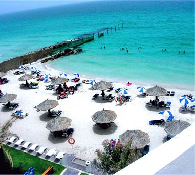Escolha um destino de férias: hotéis em Sharjah com praia privada